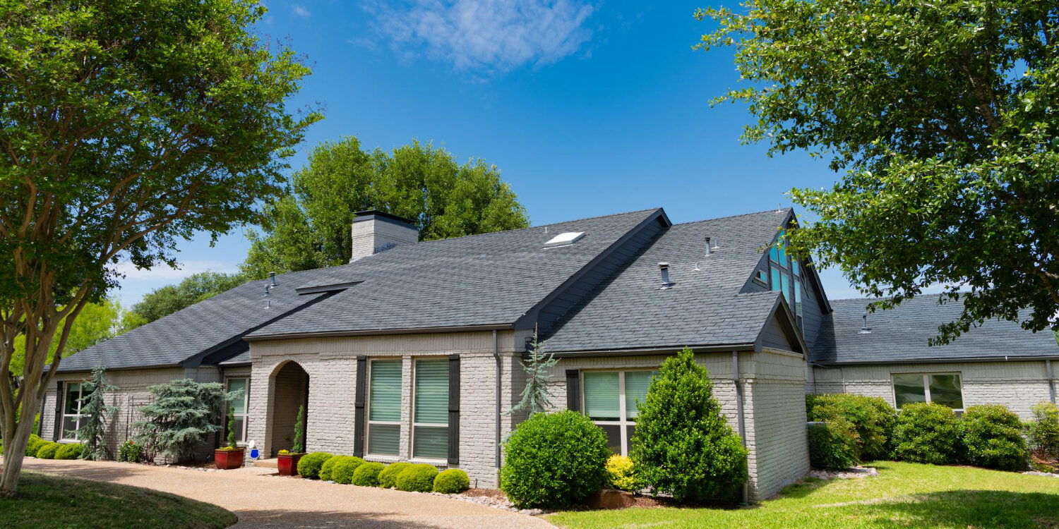 204279 Renovated home exterior in Bellville, TX showcasing curb appeal improvements