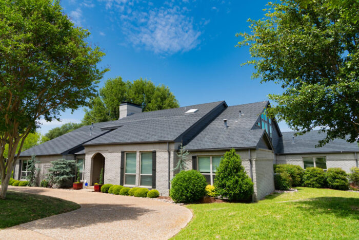 204279 Renovated home exterior in Bellville, TX showcasing curb appeal improvements
