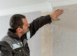 Homeowner identifying home remodeling signs before spring renovation
