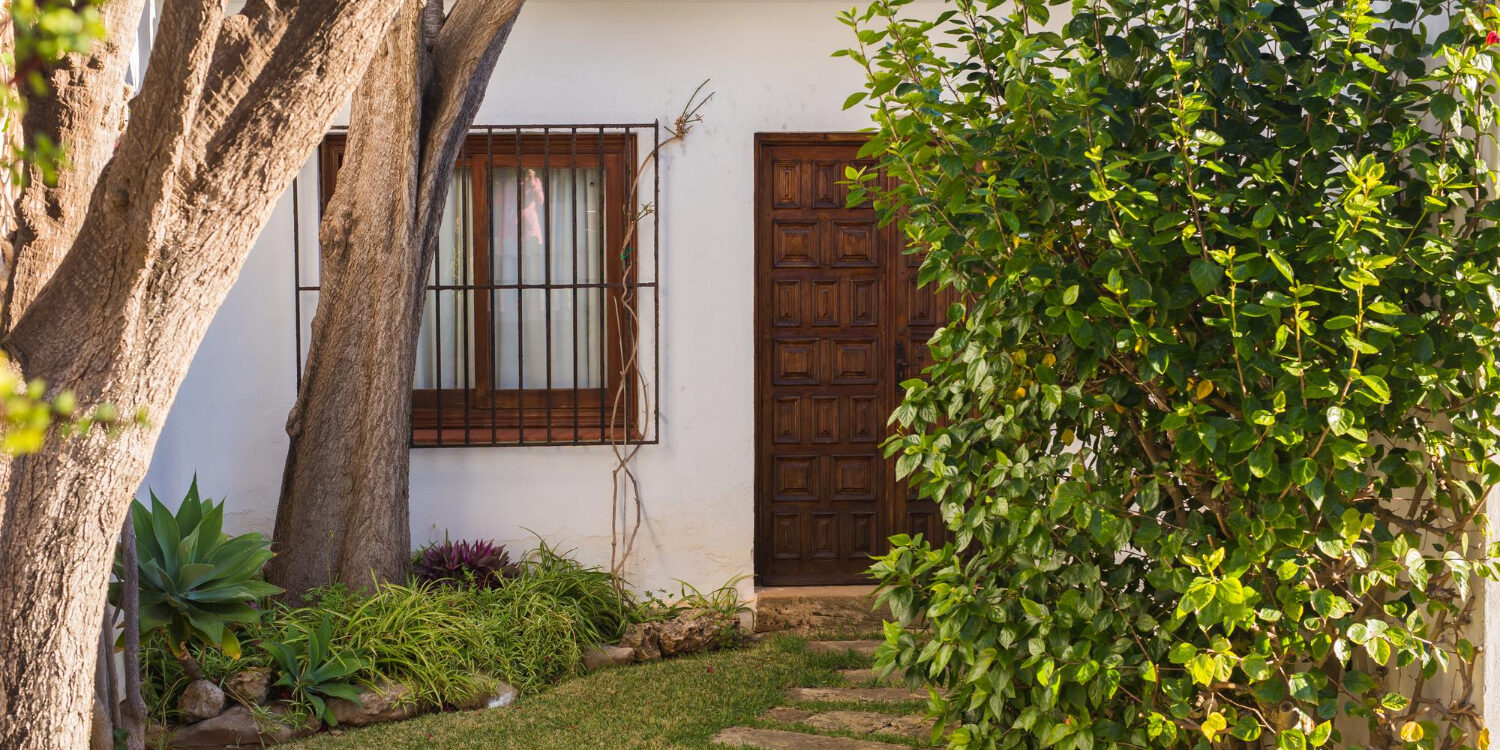 summer curb appeal home exterior with landscaping and fresh paint